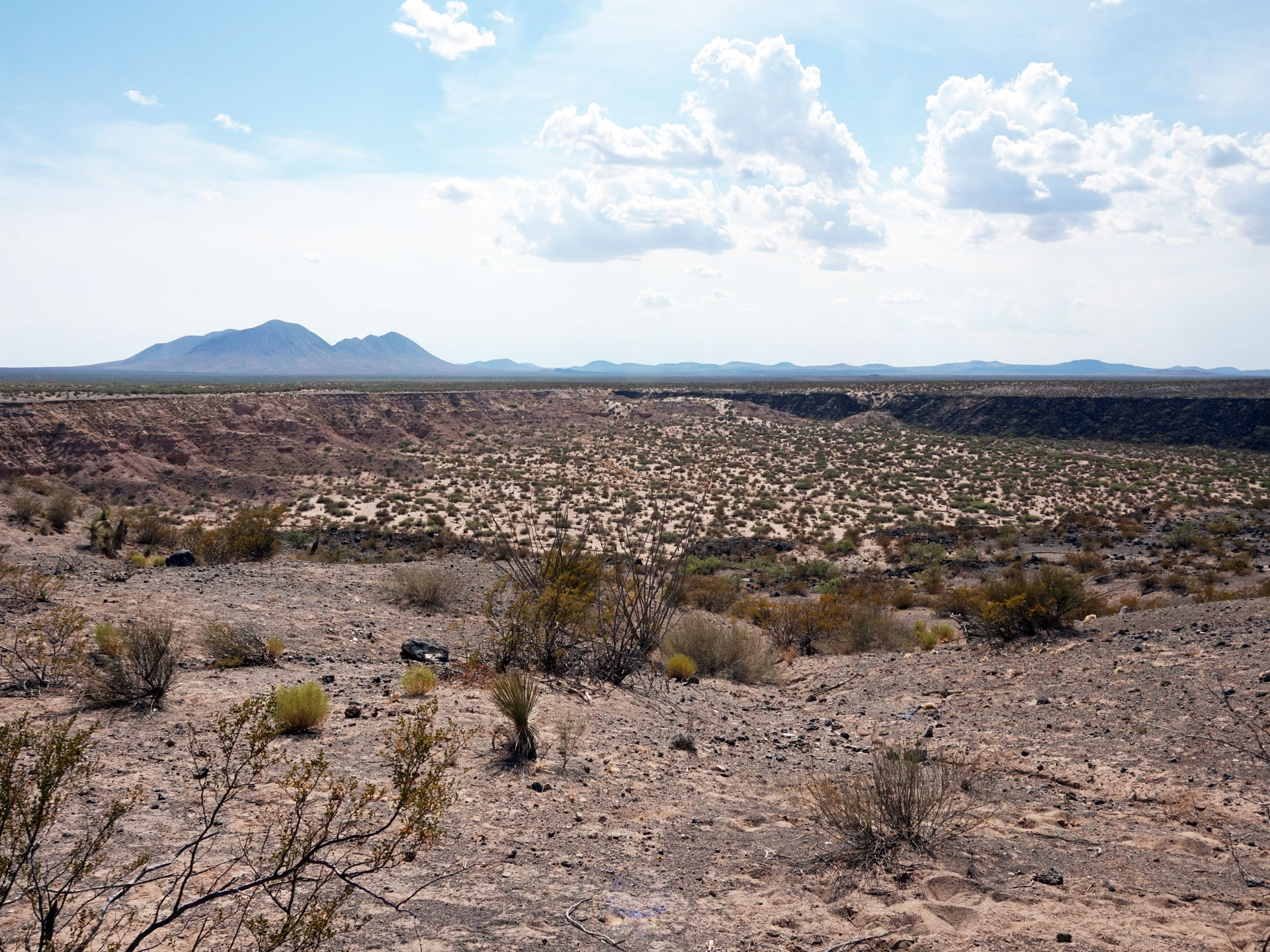 Looking out over the rim of Kilbourne Hole, a maar volcanic crater in southern New Mexico.