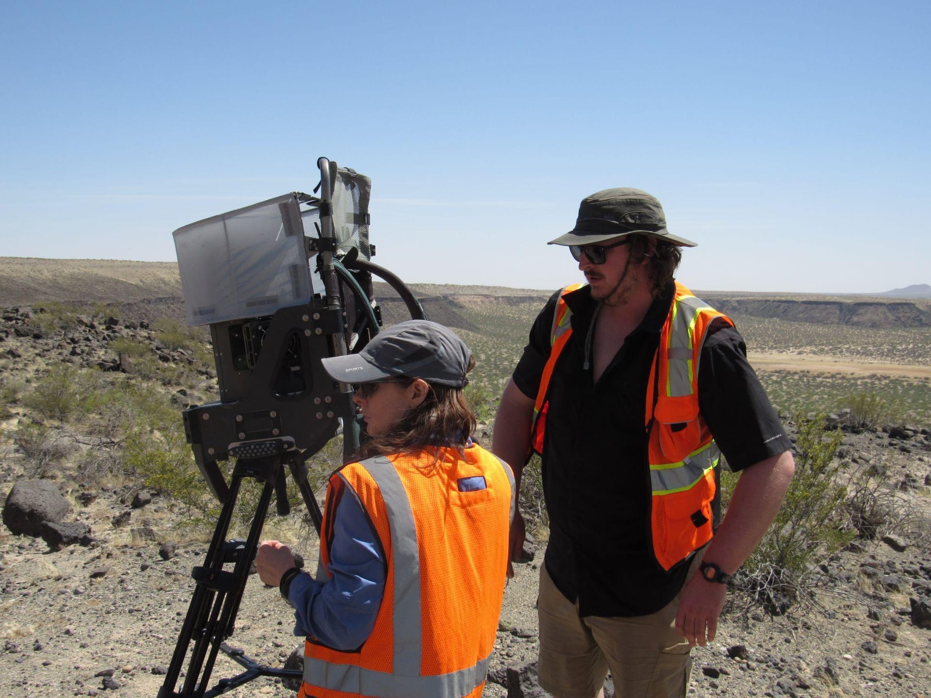 Deanne Rogers and SBU graduate student Reed Hopkins, using the hyperspectral thermal infrared sensor.